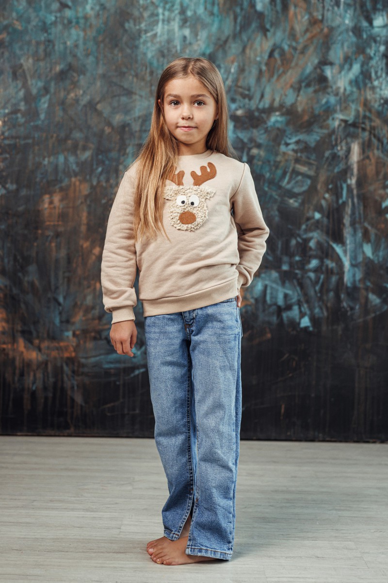 Girl's sand Christmas jumper with a "Teddy" reindeer