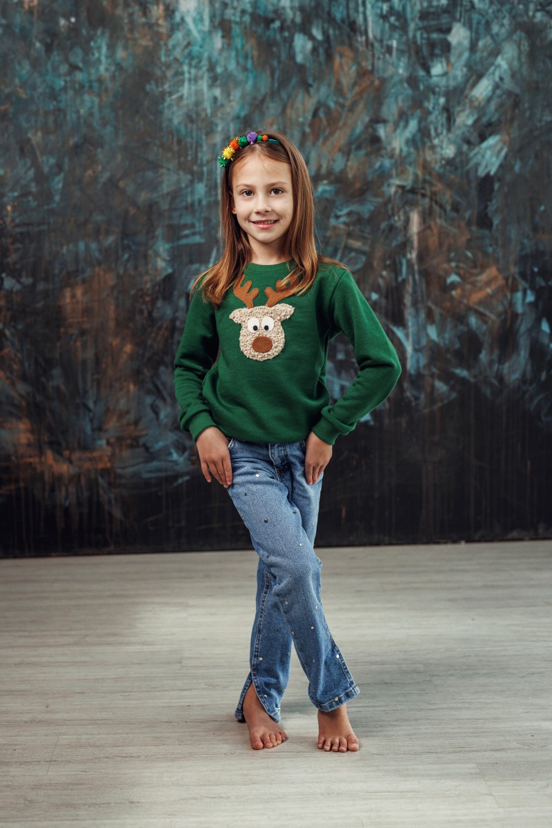 Girl's green Christmas jumper with a "Teddy" reindeer