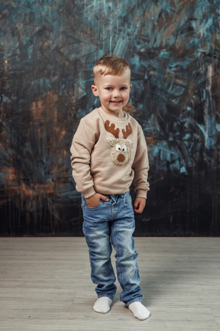 Boy's sand Christmas jumper with a "Teddy" reindeer