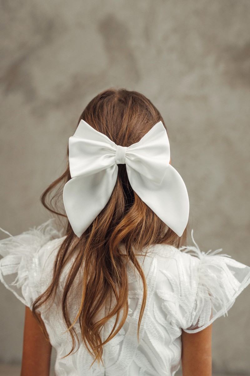 White satin brooch with a bow