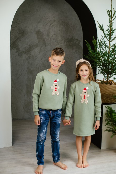 Boy's pale green Christmas jumper with gingerbread