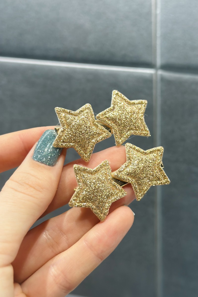 Shiny gold hair clip with 2 stars
