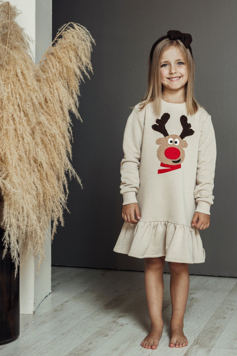 Girl's sand dress with a ruffle and Rudolf