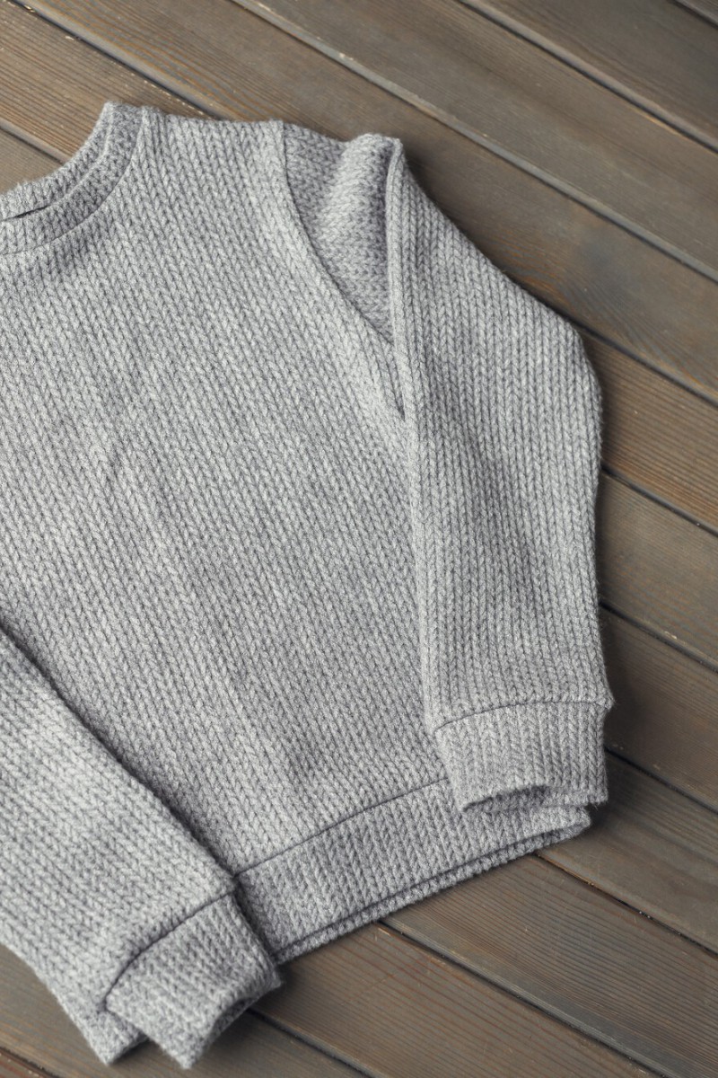 Girl's grey knitted jumper
