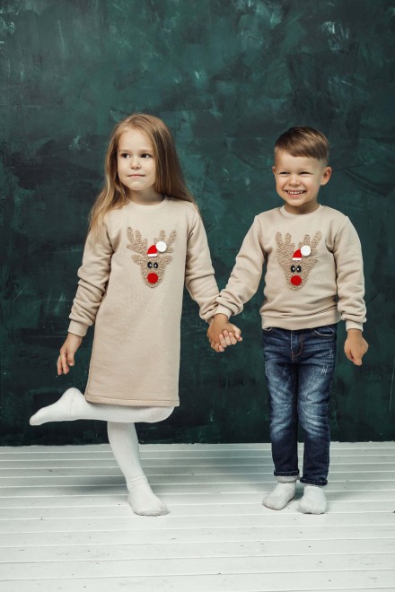 Girl's sand dress with a soft reindeer