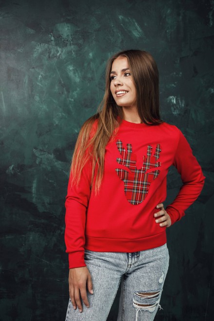 Women's red jumper with a checked reindeer